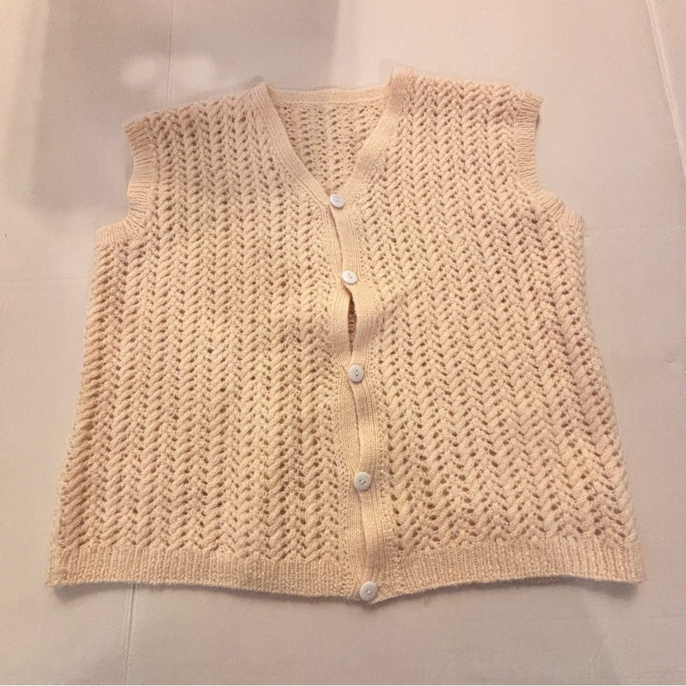 Hand Knit Cardigan Vest
Cream Wool
large
Grandma called she wants her vest back!